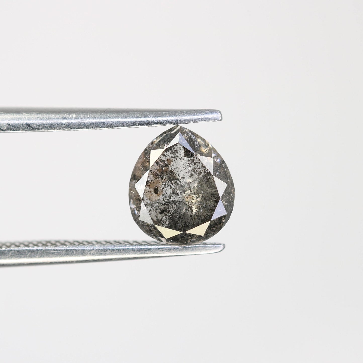 Elegant Pear-Shaped Salt and Pepper Diamond - Distinctive Gemstone for Engagement Rings, Artisan Jewelry & Custom Designs