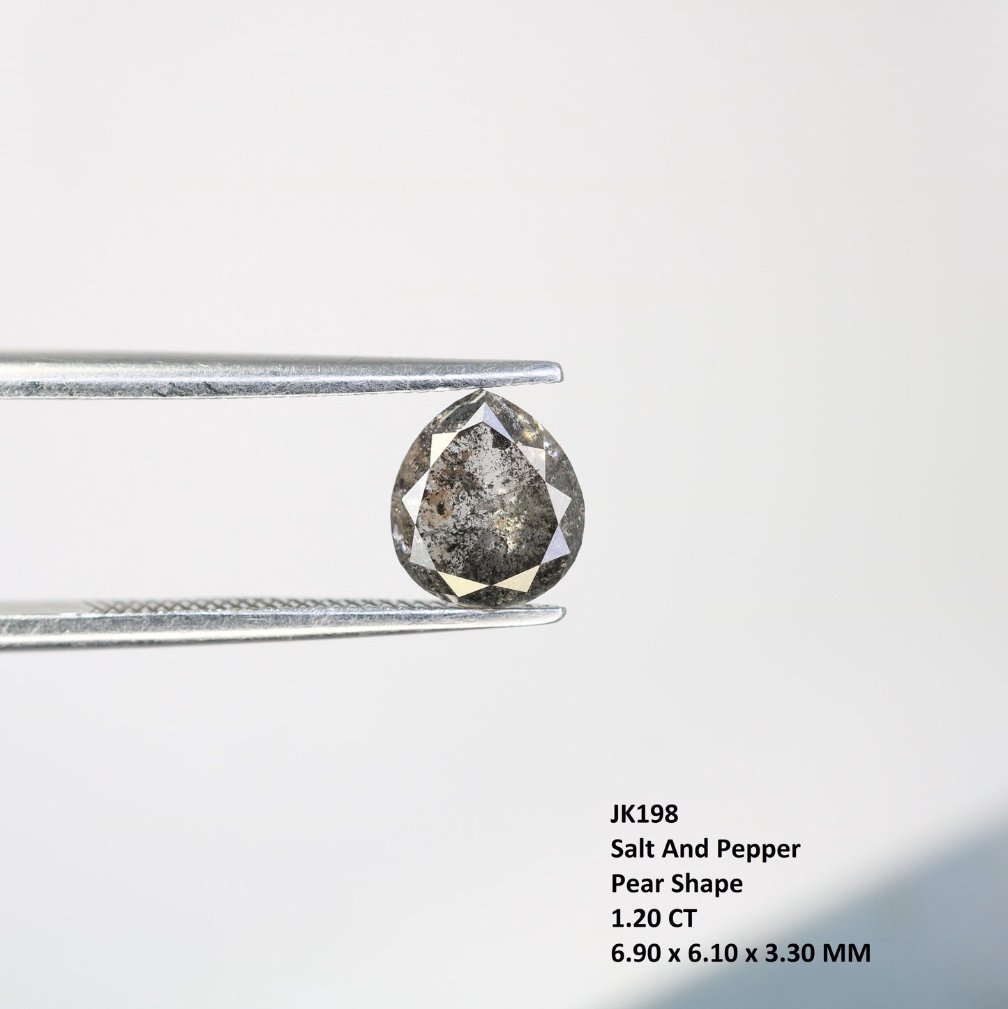 Elegant Pear-Shaped Salt and Pepper Diamond - Distinctive Gemstone for Engagement Rings, Artisan Jewelry & Custom Designs