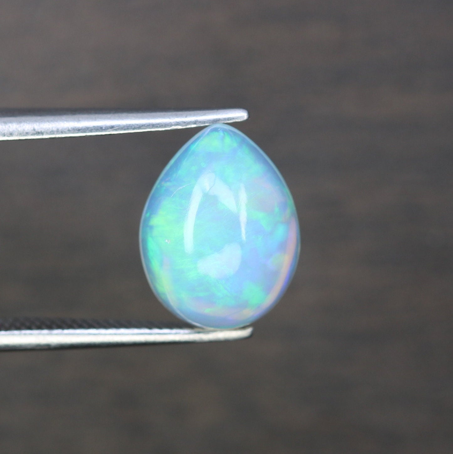 1.49 CT Rainbow Blue Opal Pear Shape Gemstone for Engagement Ring - Stunning Wedding Ring and Gift for Her with Gold Ring and Diamonds
