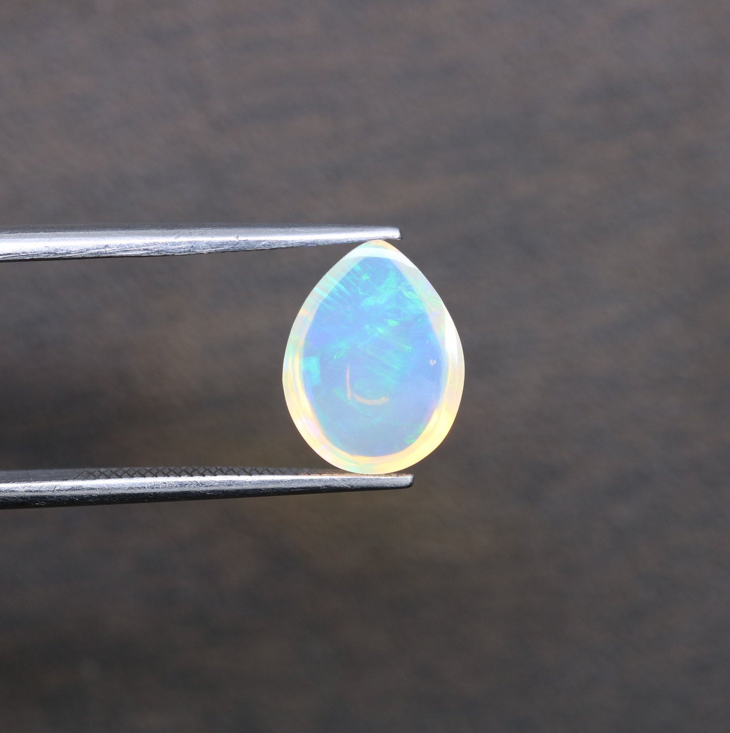 1.49 CT Rainbow Blue Opal Pear Shape Gemstone for Engagement Ring - Stunning Wedding Ring and Gift for Her with Gold Ring and Diamonds