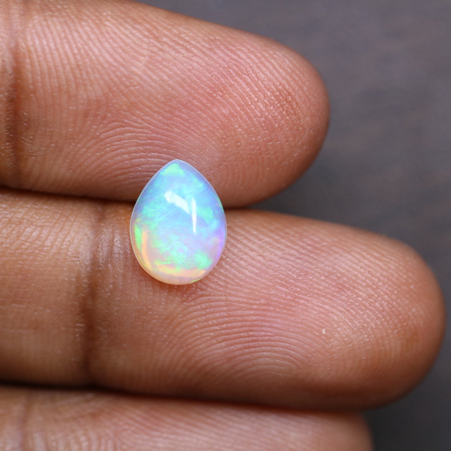 1.49 CT Rainbow Blue Opal Pear Shape Gemstone for Engagement Ring - Stunning Wedding Ring and Gift for Her with Gold Ring and Diamonds