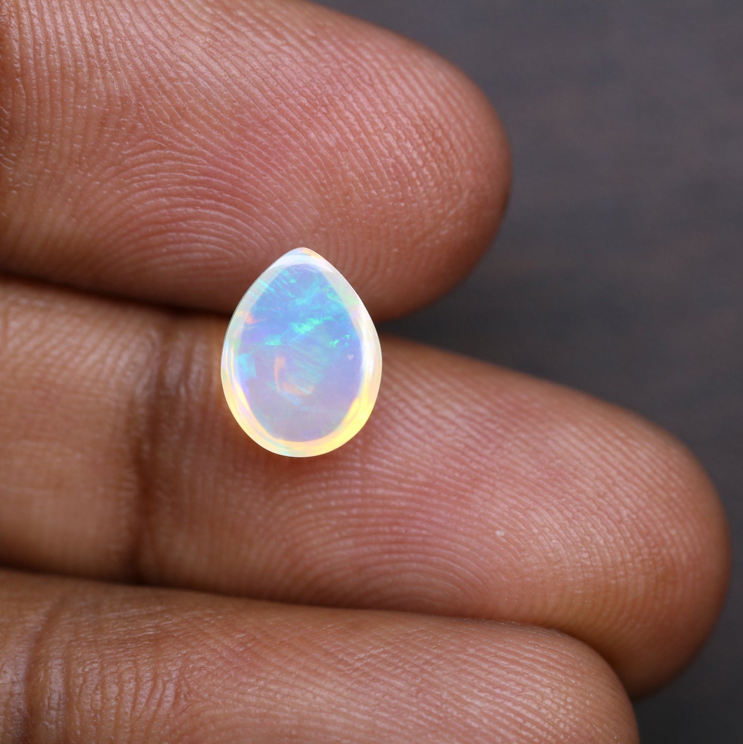 1.49 CT Rainbow Blue Opal Pear Shape Gemstone for Engagement Ring - Stunning Wedding Ring and Gift for Her with Gold Ring and Diamonds
