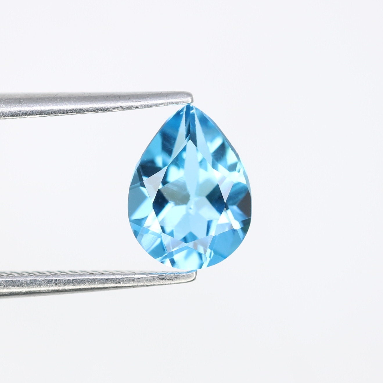 1.32 CT Swiss Blue Pear Shape Gem for Proposal Ring - Fancy Color Diamond for Customized Jewelry Making with Gold Ring
