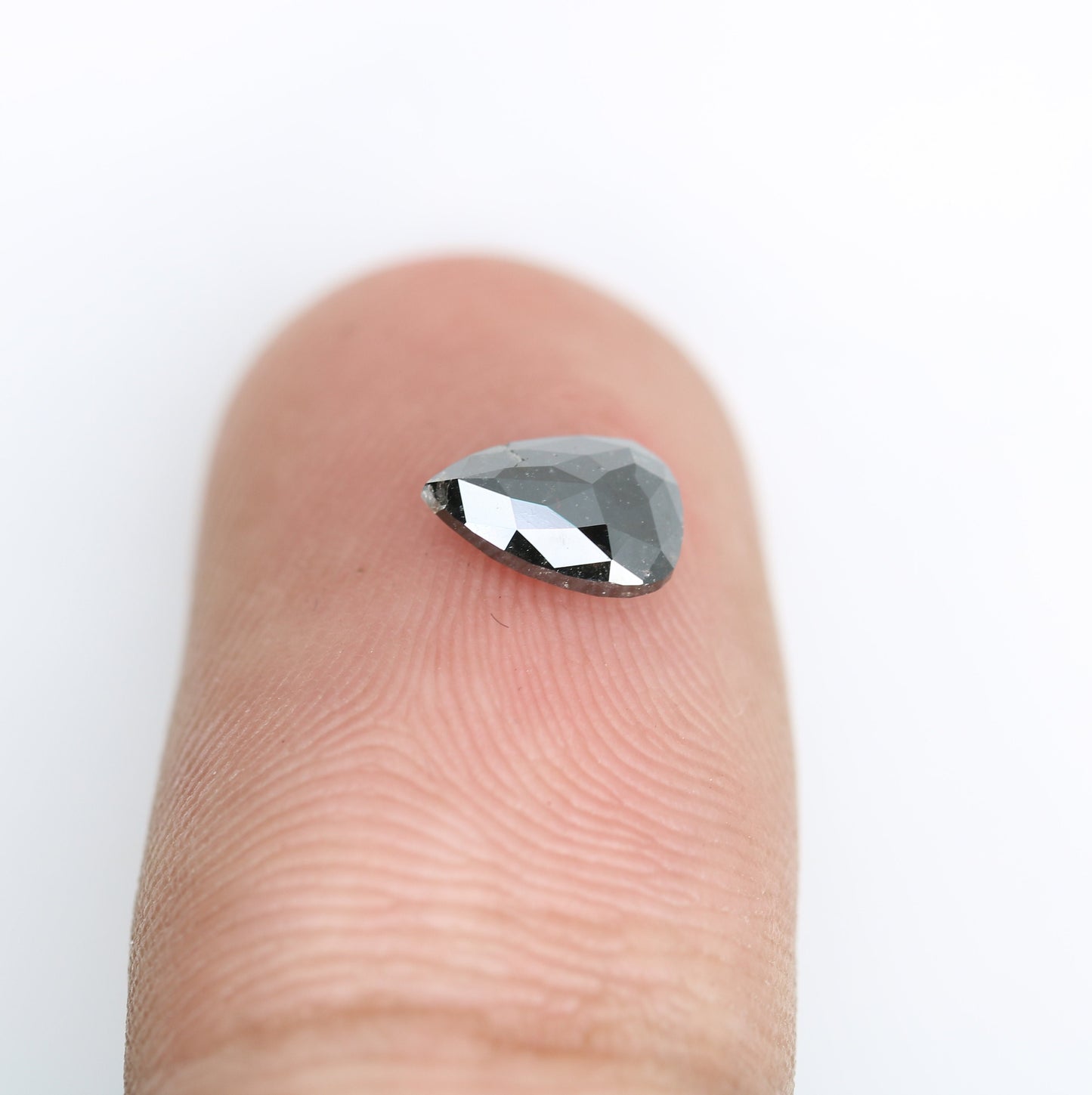 Intriguing & Edgy Pear-Shaped Black Diamond Engagement Ring