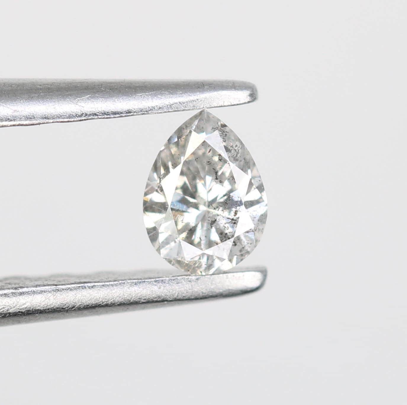 0.17 CT Stunning White Pear Shape Salt and Pepper Diamond - Natural Loose Gemstone Ideal for Engagement Rings and Unique Jewelry Creations.