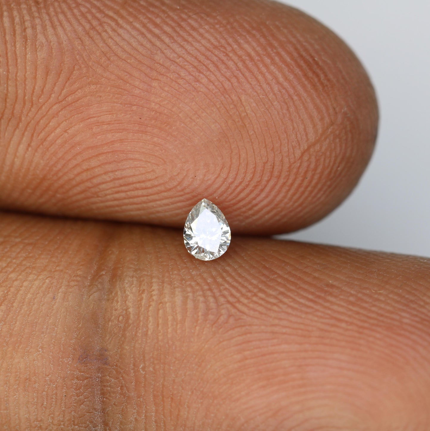 0.17 CT Stunning White Pear Shape Salt and Pepper Diamond - Natural Loose Gemstone Ideal for Engagement Rings and Unique Jewelry Creations.