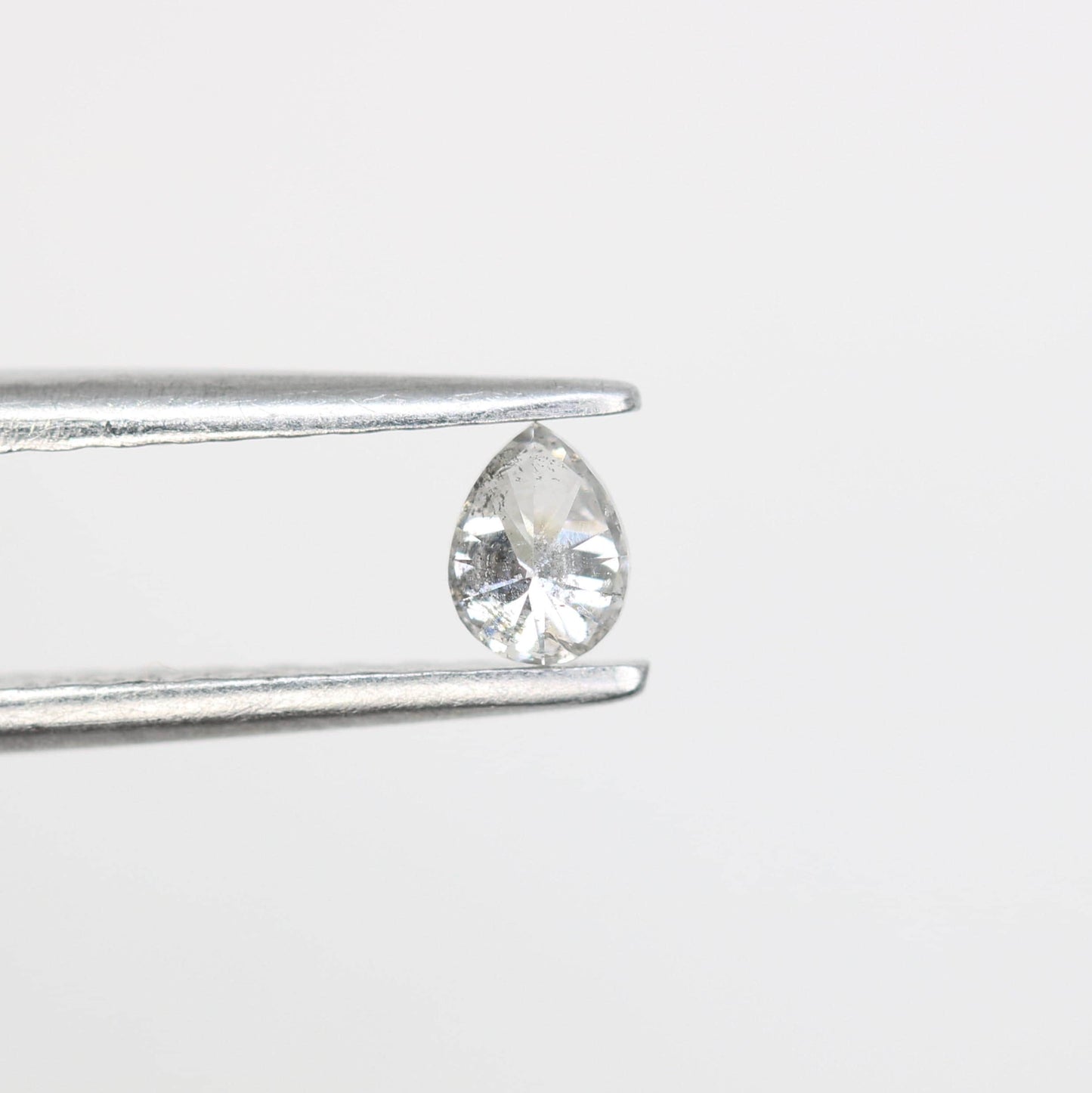 0.17 CT Stunning White Pear Shape Salt and Pepper Diamond - Natural Loose Gemstone Ideal for Engagement Rings and Unique Jewelry Creations.