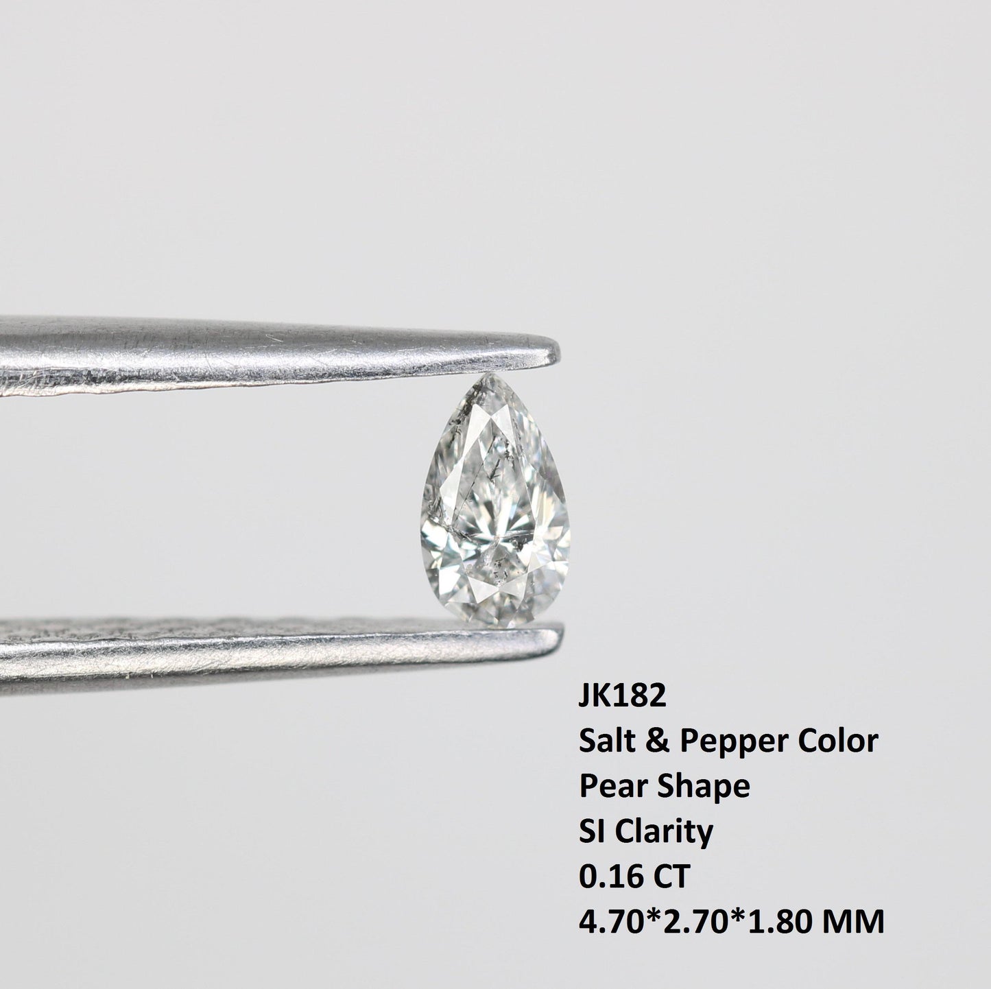 0.16 CT Elegant Natural White Salt and Pepper Pear Shape Diamond - Unique Loose Gemstone for Engagement Rings and Custom Jewelry Designs.