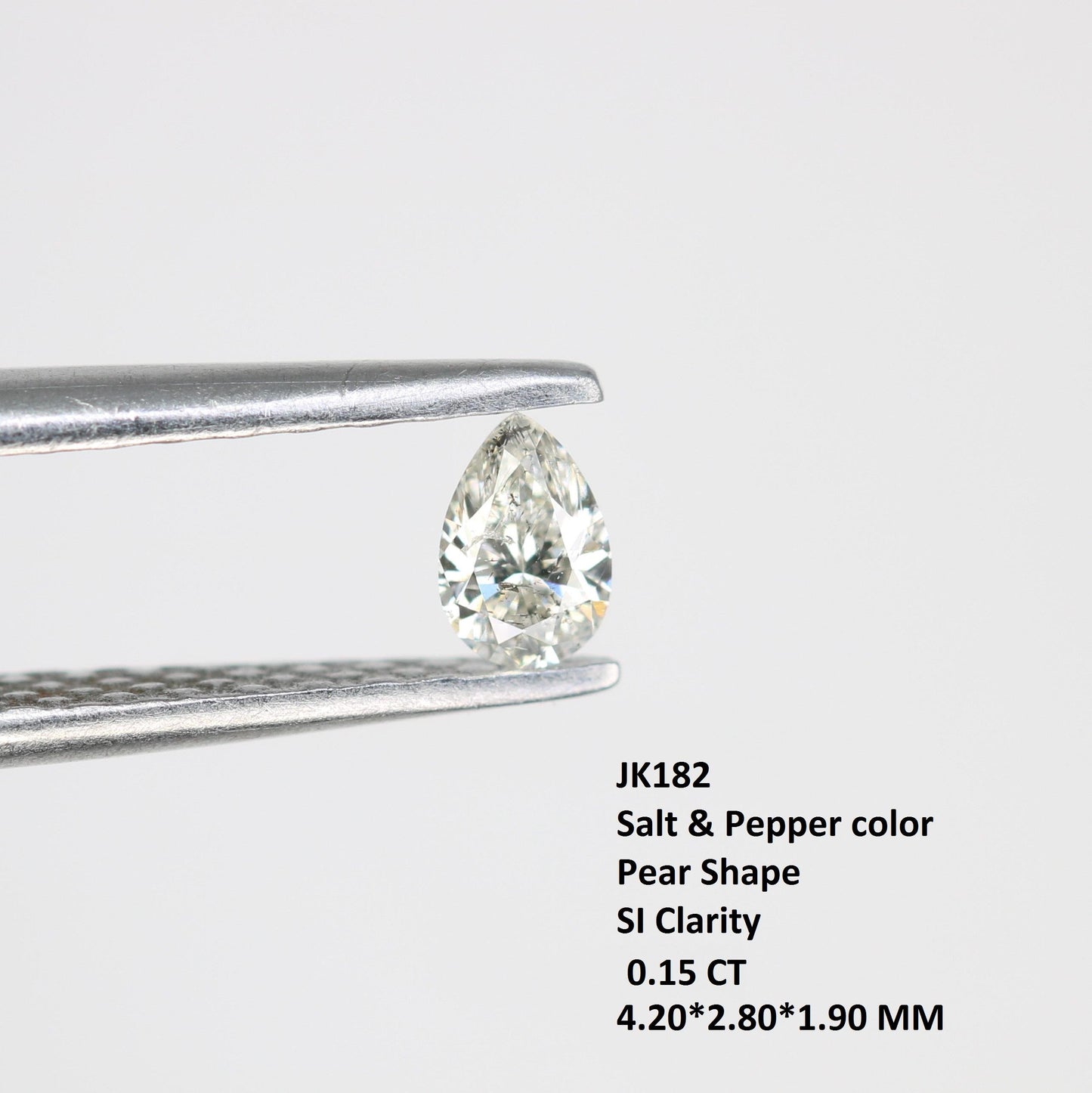 0.15 CT Raw Natural Pear Shape Salt and Pepper Diamond - Unique White Loose Stone Perfect for Custom Engagement Rings and Jewelry Designs.