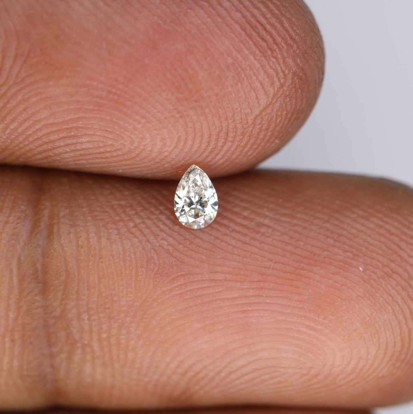 0.15 CT Raw Natural Pear Shape Salt and Pepper Diamond - Unique White Loose Stone Perfect for Custom Engagement Rings and Jewelry Designs.