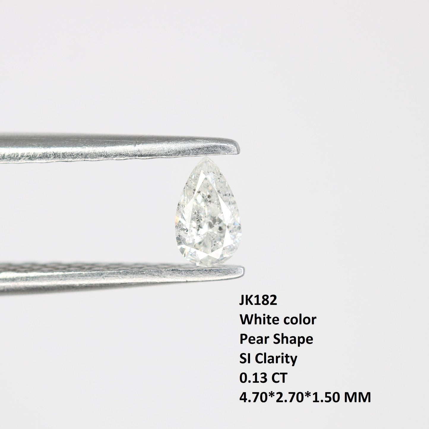 0.13 CT Natural White Salt and Pepper Pear Shape Diamond - Stunning Loose Gemstone Perfect for Custom Rings and Unique Jewelry Designs.