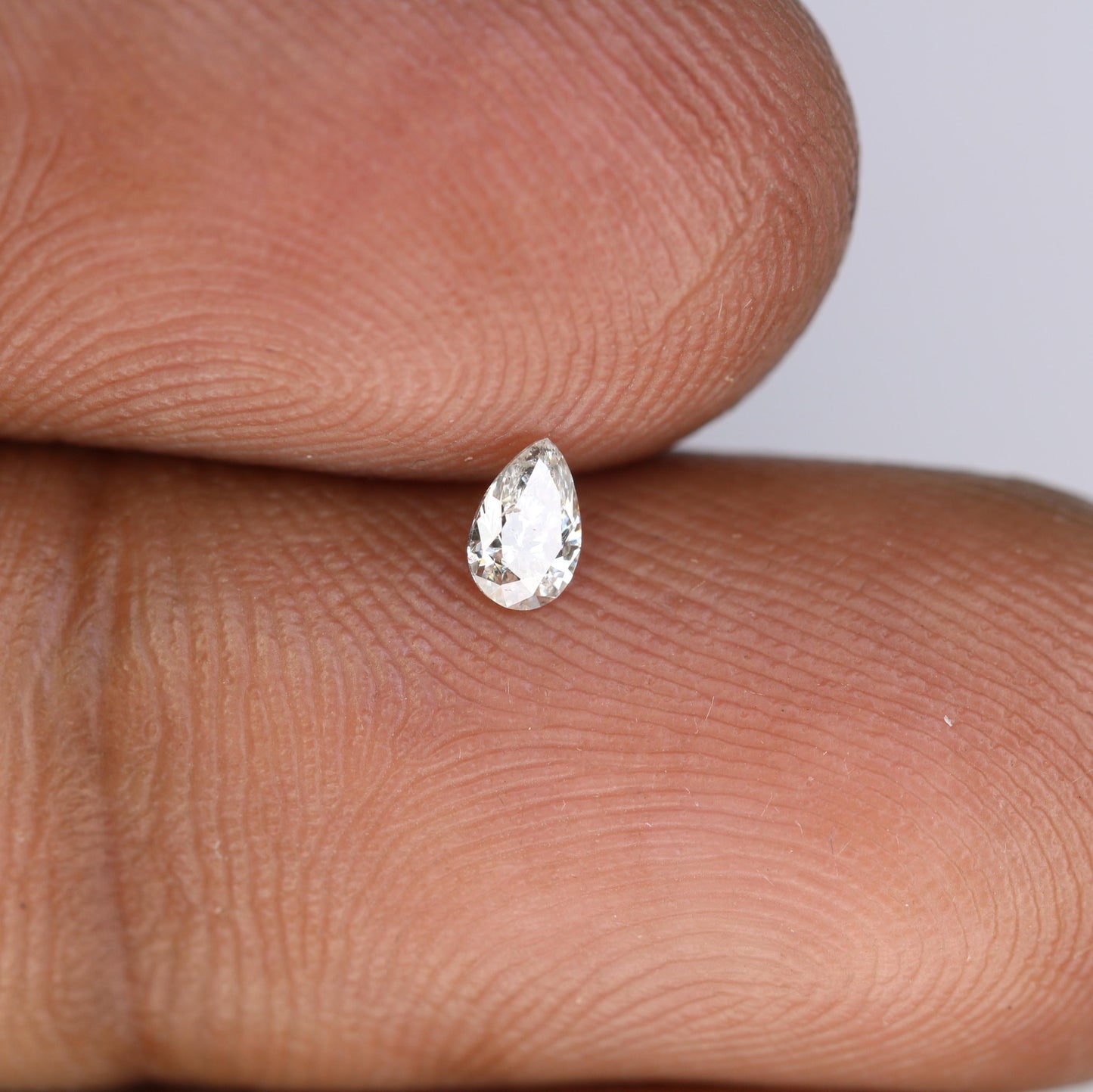 0.15 CT Raw Natural Pear Shape Salt and Pepper Diamond - Unique White Loose Stone Perfect for Custom Engagement Rings and Jewelry Designs.
