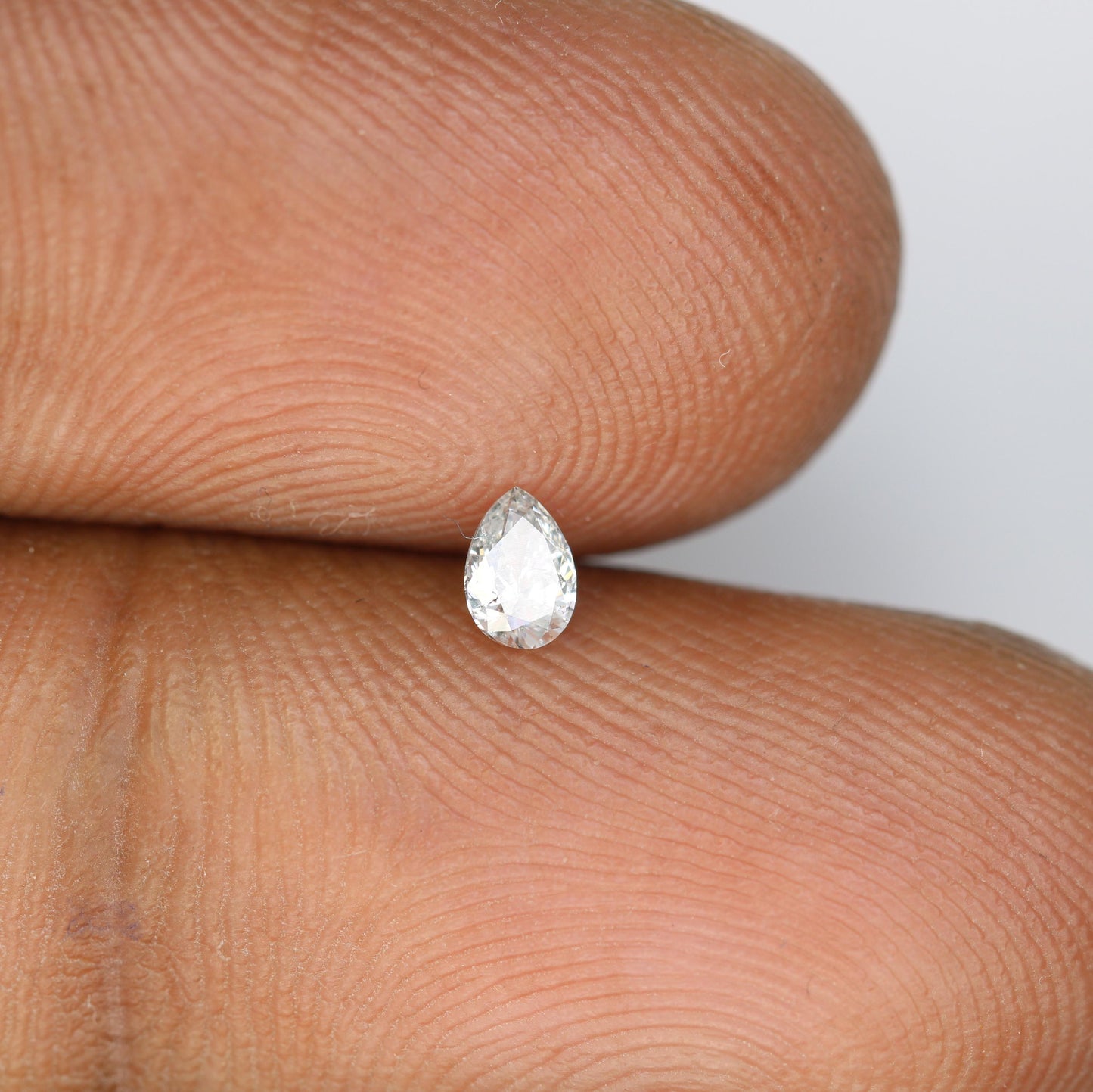 0.17 CT Unique Pear Shape Salt and Pepper Diamond - Natural White Loose Gemstone Perfect for Custom Rings and One-of-a-Kind Jewelry Pieces.