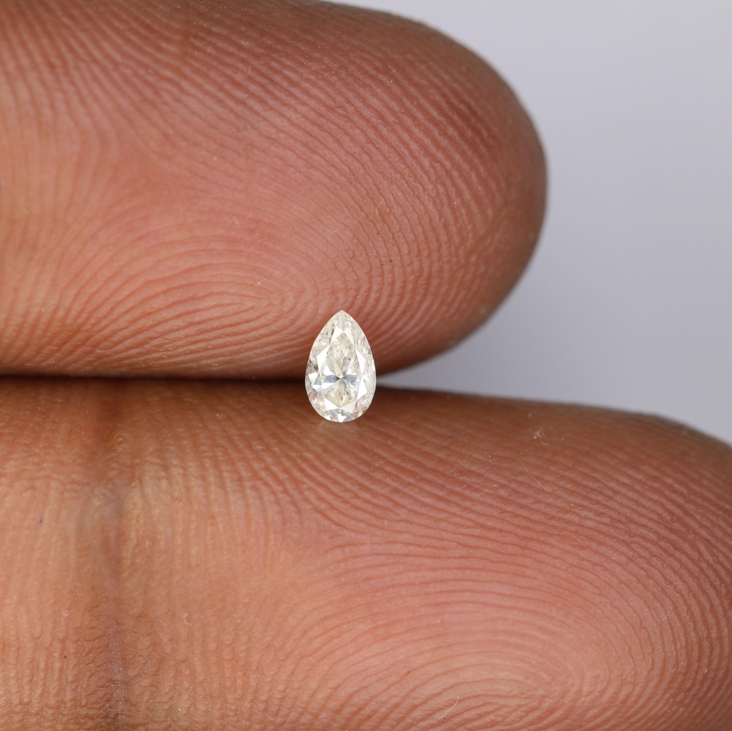 0.19 CT White Pear Shape Salt and Pepper Diamond - Natural Loose Gemstone Ideal for Unique Engagement Rings and Jewelry Creations.