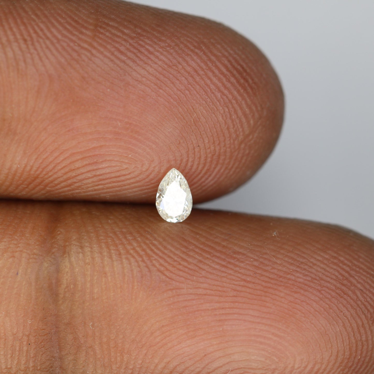 0.19 CT White Pear Shape Salt and Pepper Diamond - Natural Loose Gemstone Ideal for Unique Engagement Rings and Jewelry Creations.