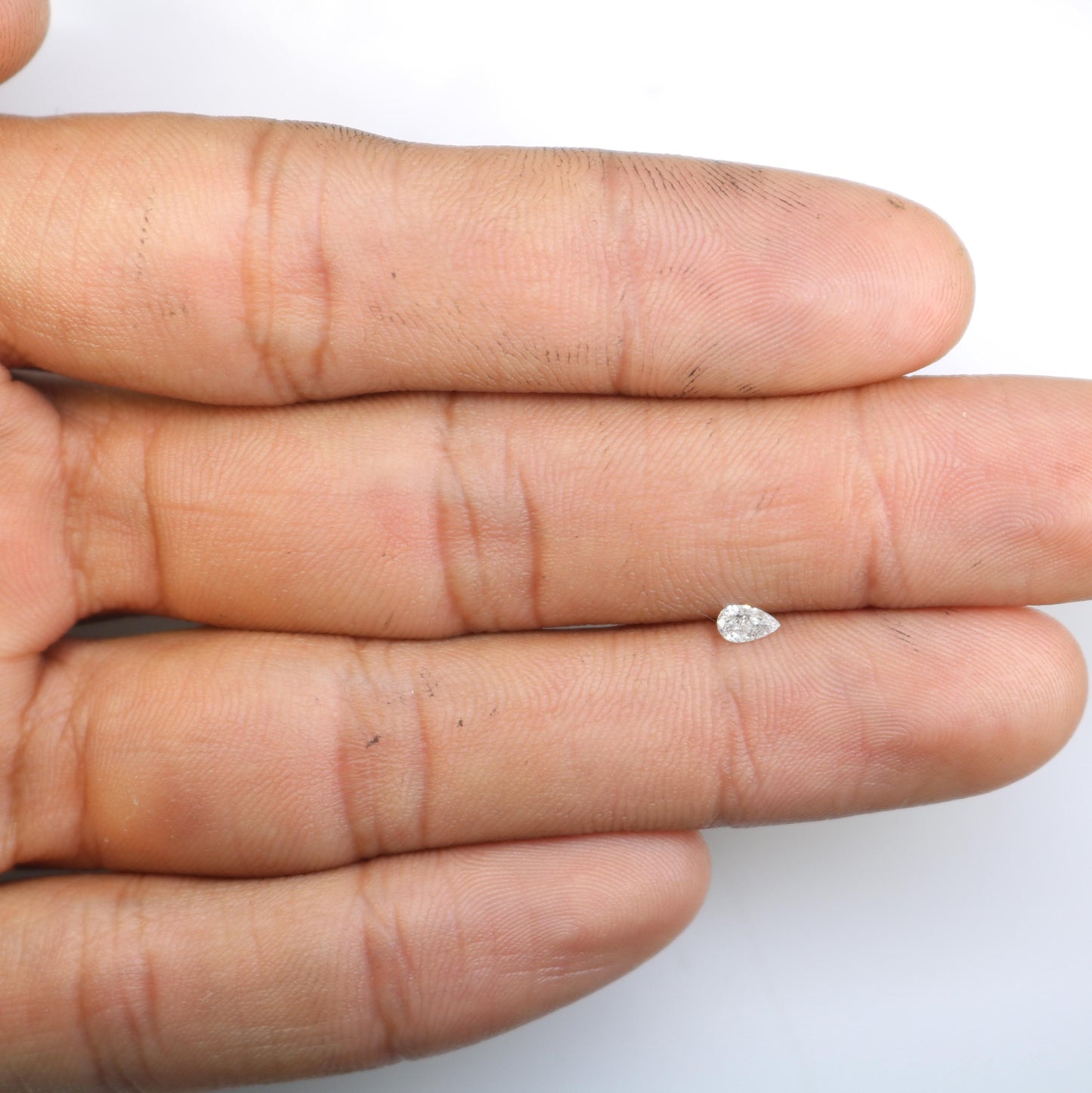 0.13 CT Natural White Salt and Pepper Pear Shape Diamond - Stunning Loose Gemstone Perfect for Custom Rings and Unique Jewelry Designs.