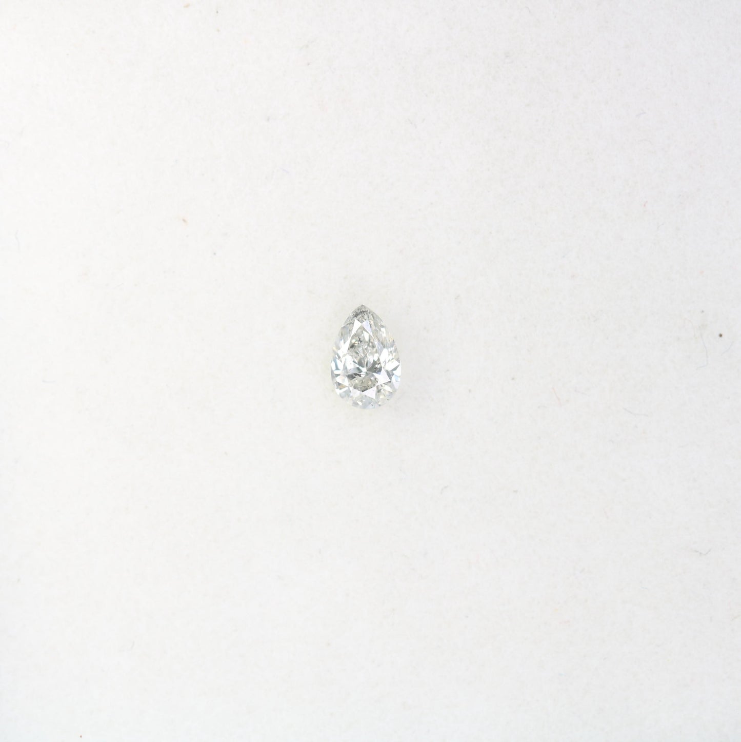 0.15 CT Raw Natural Pear Shape Salt and Pepper Diamond - Unique White Loose Stone Perfect for Custom Engagement Rings and Jewelry Designs.