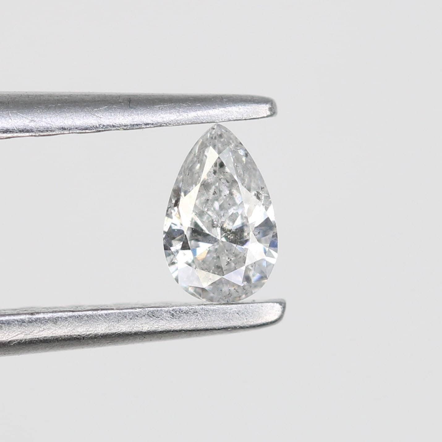 0.14 CT Pear Shape Salt and Pepper Diamond - Natural White Loose Gemstone Ideal for Engagement Rings and Artisan Jewelry Design.