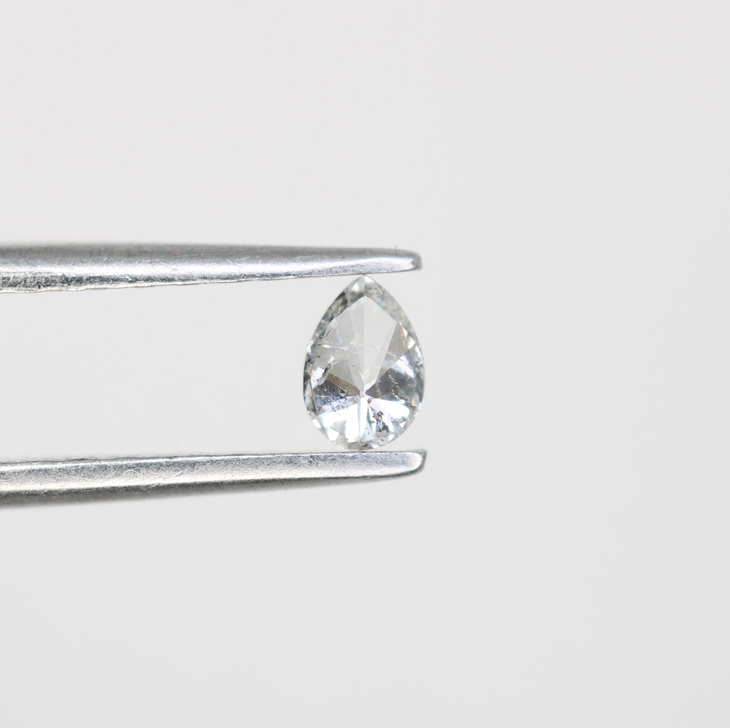 0.17 CT Unique Pear Shape Salt and Pepper Diamond - Natural White Loose Gemstone Perfect for Custom Rings and One-of-a-Kind Jewelry Pieces.