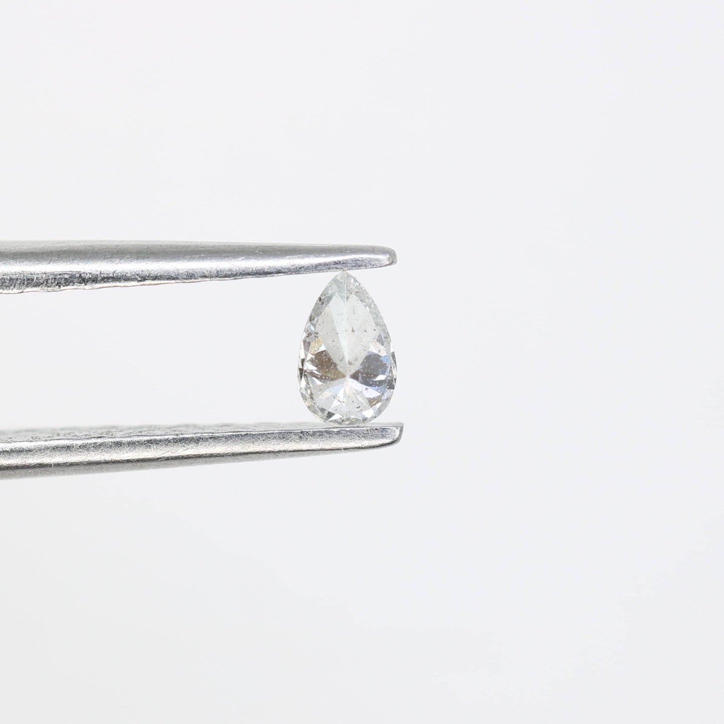 0.14 CT Pear Shape Salt and Pepper Diamond - Natural White Loose Gemstone Ideal for Engagement Rings and Artisan Jewelry Design.