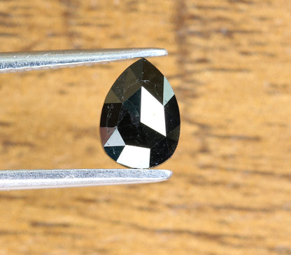 0.56 CT Pear Shape Brilliant Cut Natural Loose Diamond | Heated Black Color | Fancy Black Pear Cut Gem for Unique Jewelry Designs