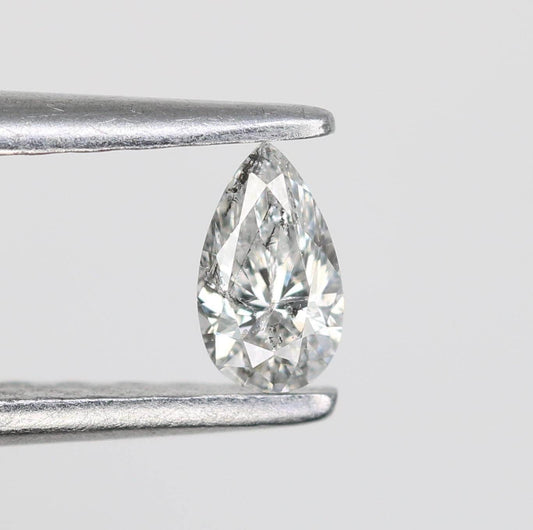 0.16 CT Elegant Natural White Salt and Pepper Pear Shape Diamond - Unique Loose Gemstone for Engagement Rings and Custom Jewelry Designs.