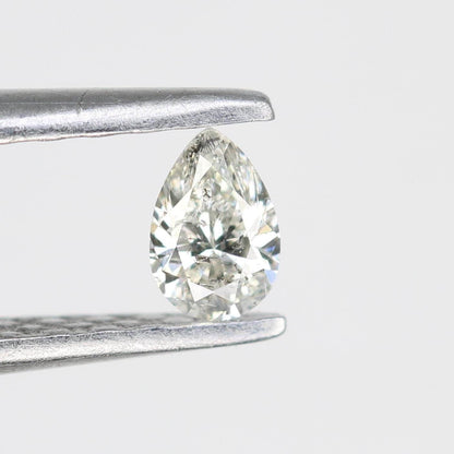 0.15 CT Raw Natural Pear Shape Salt and Pepper Diamond - Unique White Loose Stone Perfect for Custom Engagement Rings and Jewelry Designs.