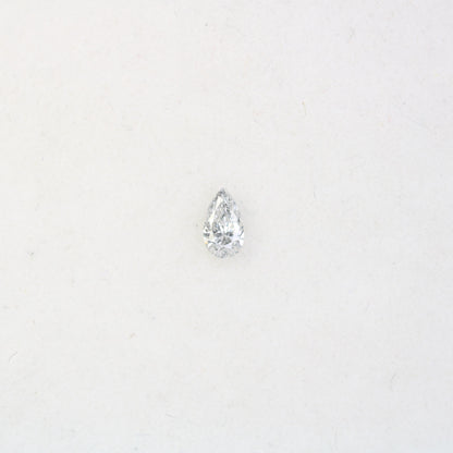 0.16 CT Elegant Natural White Salt and Pepper Pear Shape Diamond - Unique Loose Gemstone for Engagement Rings and Custom Jewelry Designs.
