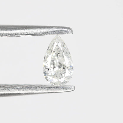 0.13 CT Natural White Salt and Pepper Pear Shape Diamond - Stunning Loose Gemstone Perfect for Custom Rings and Unique Jewelry Designs.