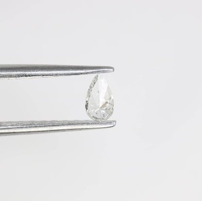 0.13 CT Natural White Salt and Pepper Pear Shape Diamond - Stunning Loose Gemstone Perfect for Custom Rings and Unique Jewelry Designs.